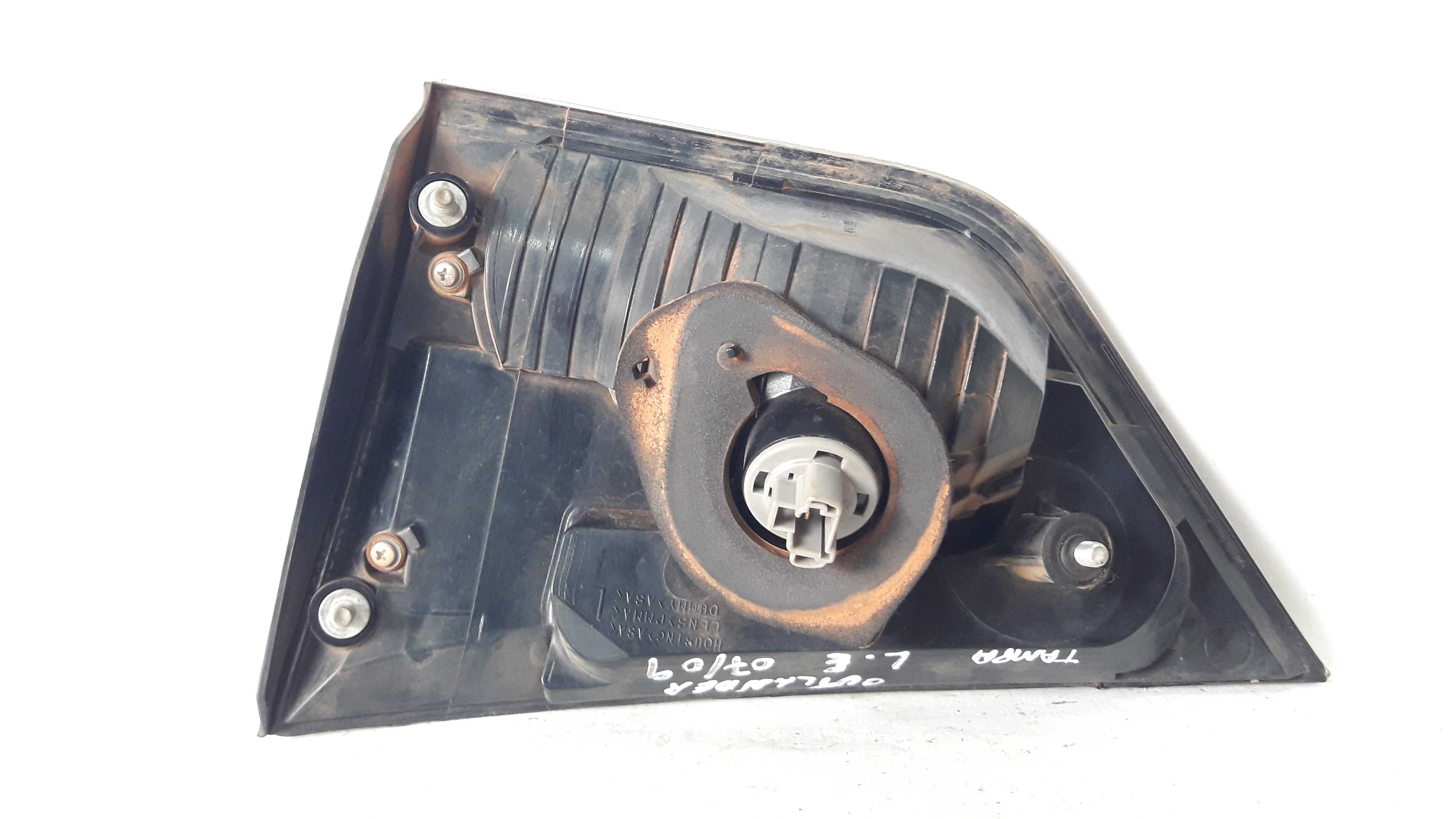 Lanterna Esquerda Tampa Traseira Outlander 2007/2009 Origina Esquerdo Transparente 2