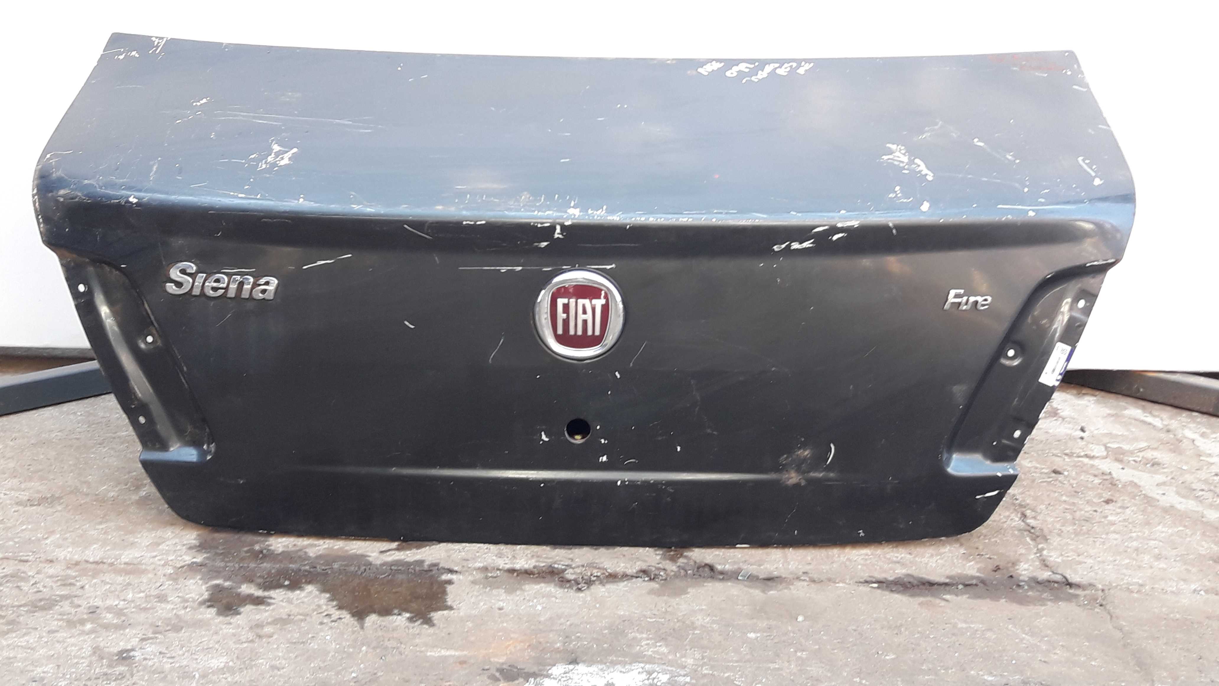 Tampa Traseira Fiat Siena Fire Zoiao Original 04/08 Chumbo