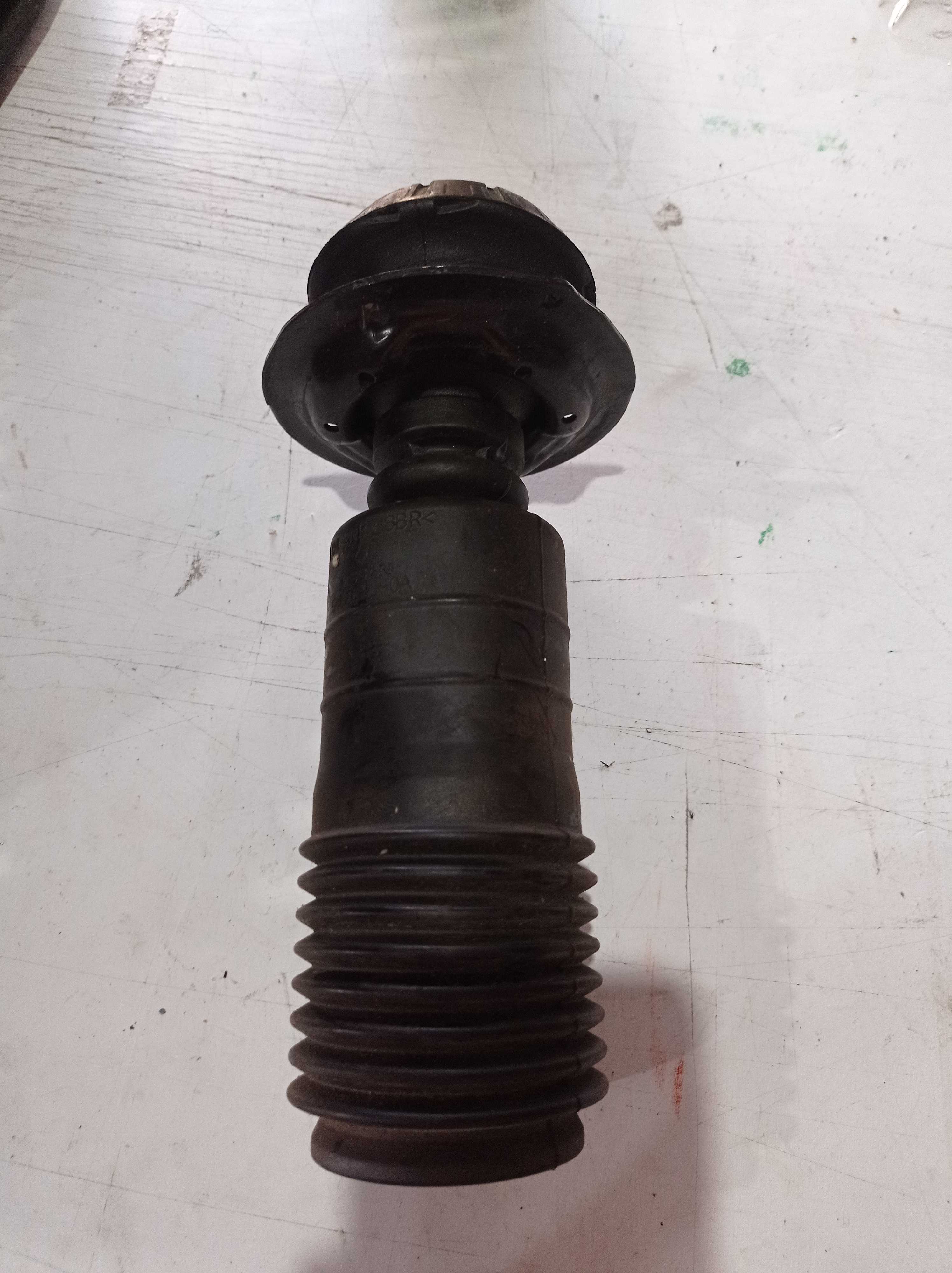 BATENTE COIFA AMORTECEDOR NISSAN MARCH 2014 A 2016