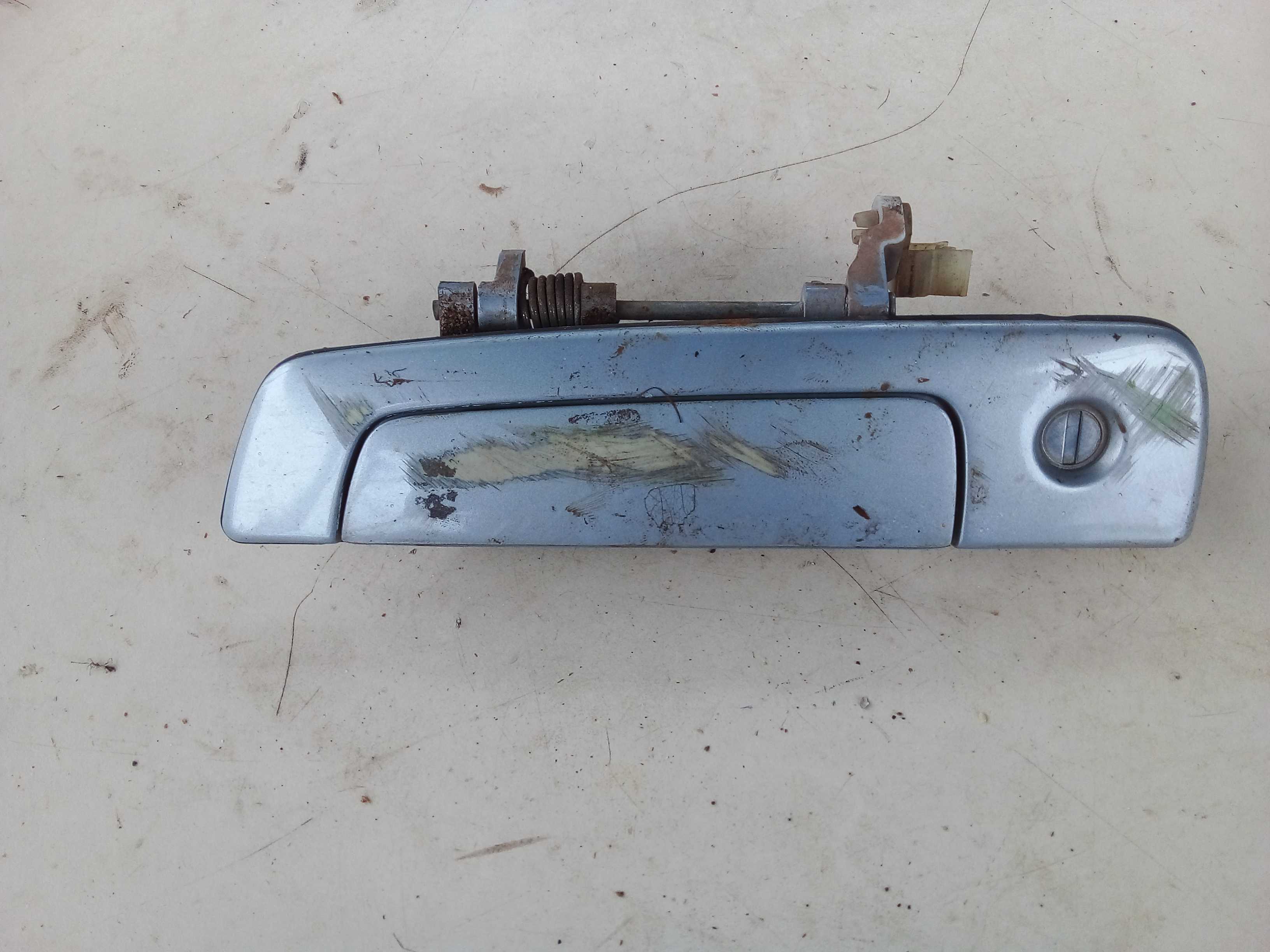 MAÇANETA EXT DIANTEIRA ESQUERDA COM MIOLO TR4 PAJERO 2009 2