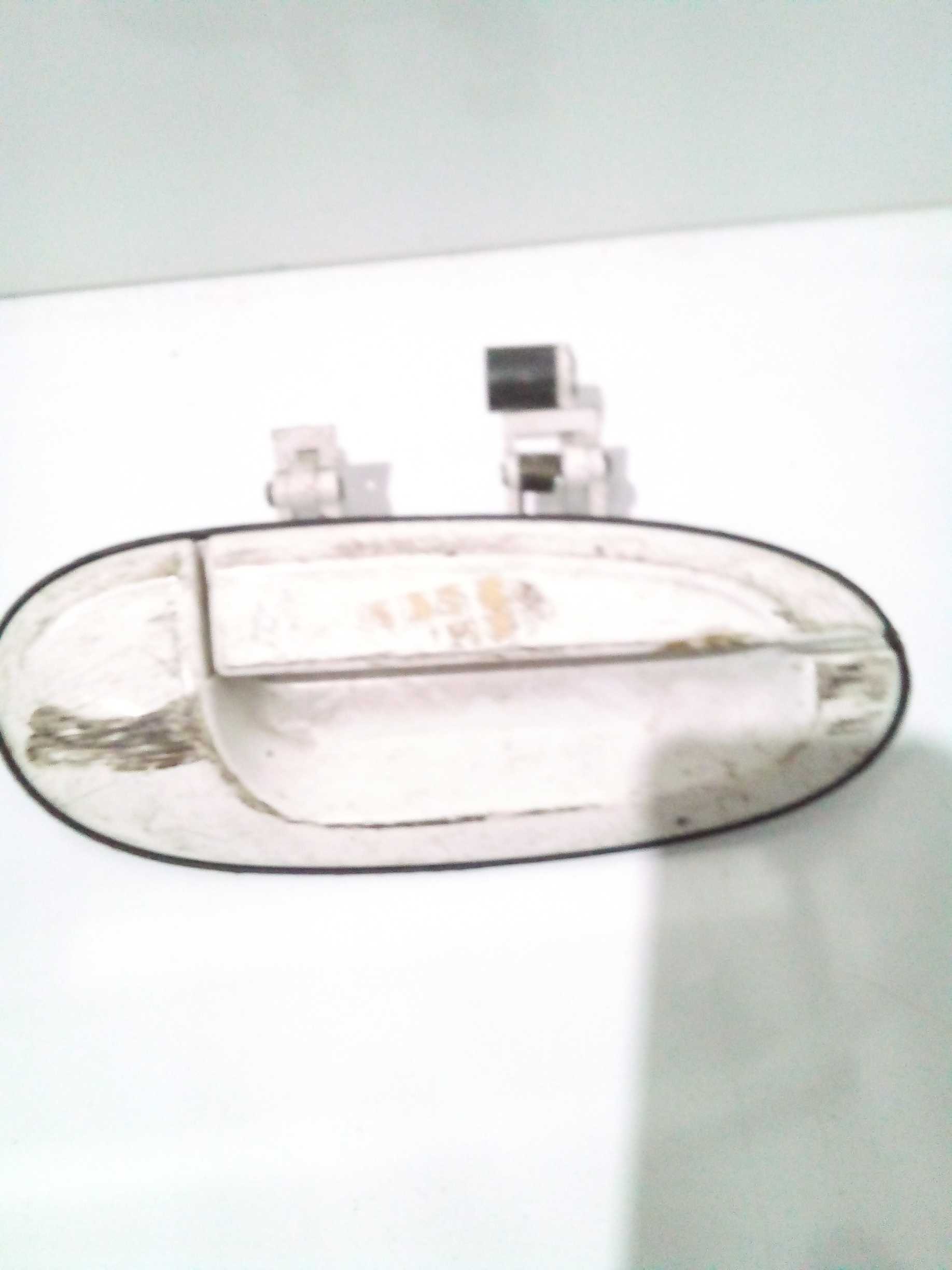 Maçaneta Ford Taurus 97 traseira direita externa 1