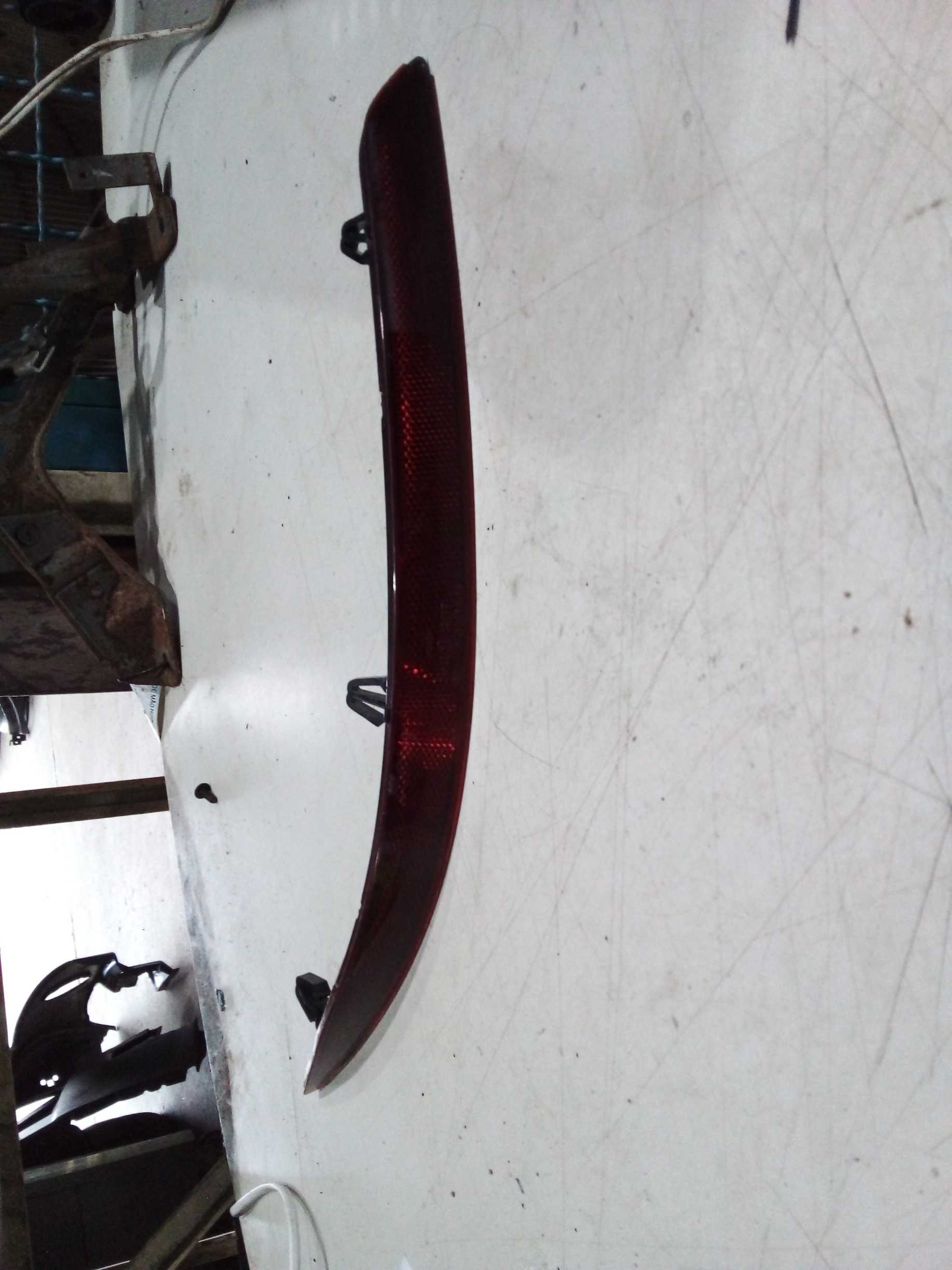 REFLETOR OLHO GATO ESQUERDO AUDI Q3 2021 2