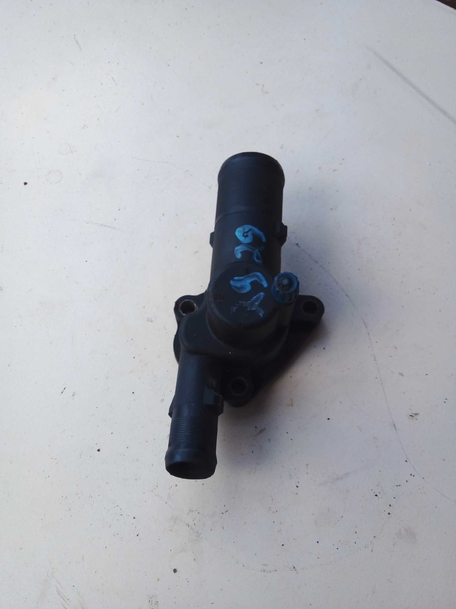 CARCAÇA VÁLVULA TERMOSTATICA SANDERO CLIO LOGAN 1.0 1