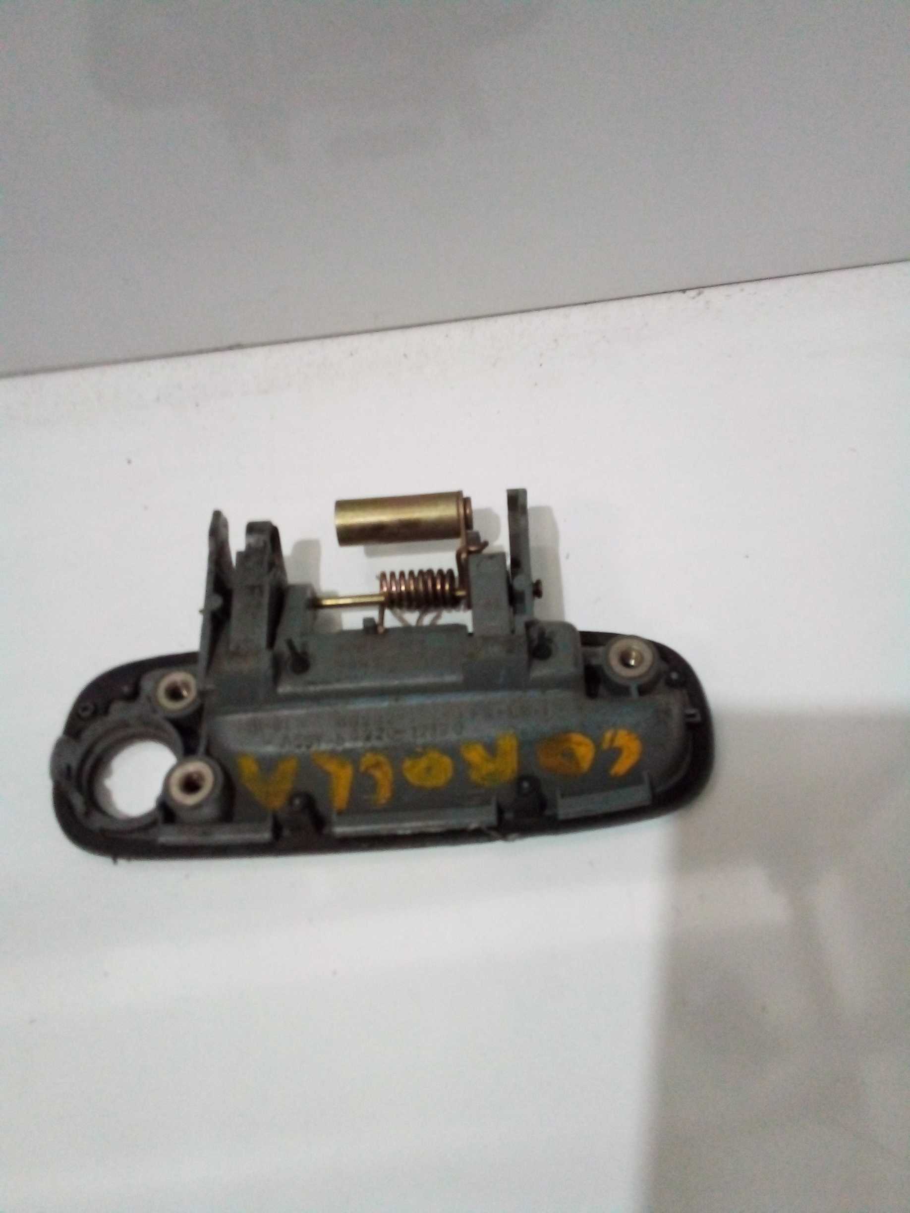 Maçaneta Toyota Corolla dianteira esquerda externa 99 2