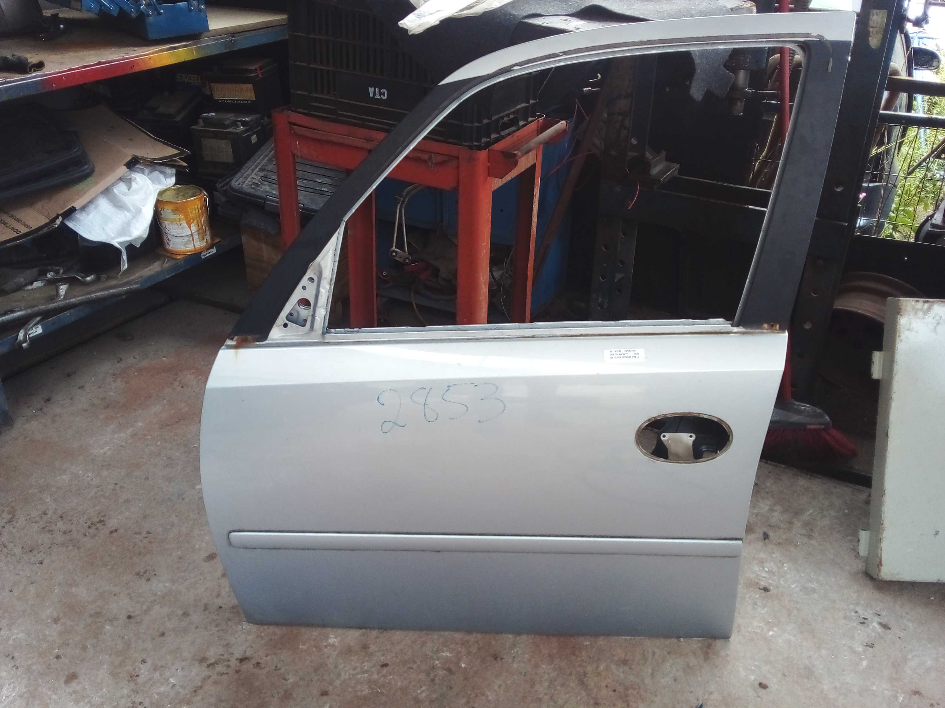 PORTA DIANTEIRA ESQ. MERIVA 2004 COM FRISO 1