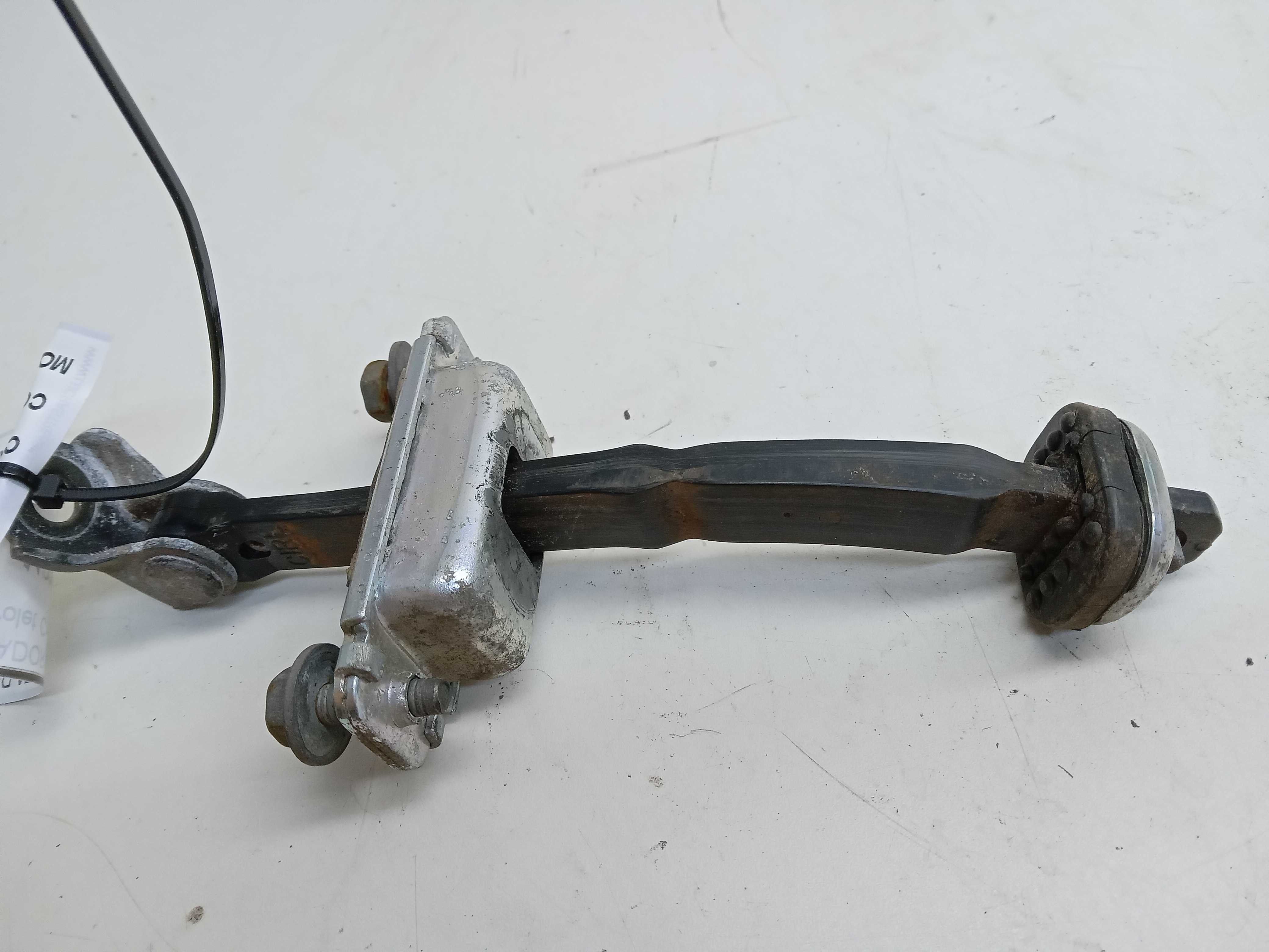LIMITADOR PORTA DIANTEIRA DIREITA Chevrolet Captiva 2009 2
