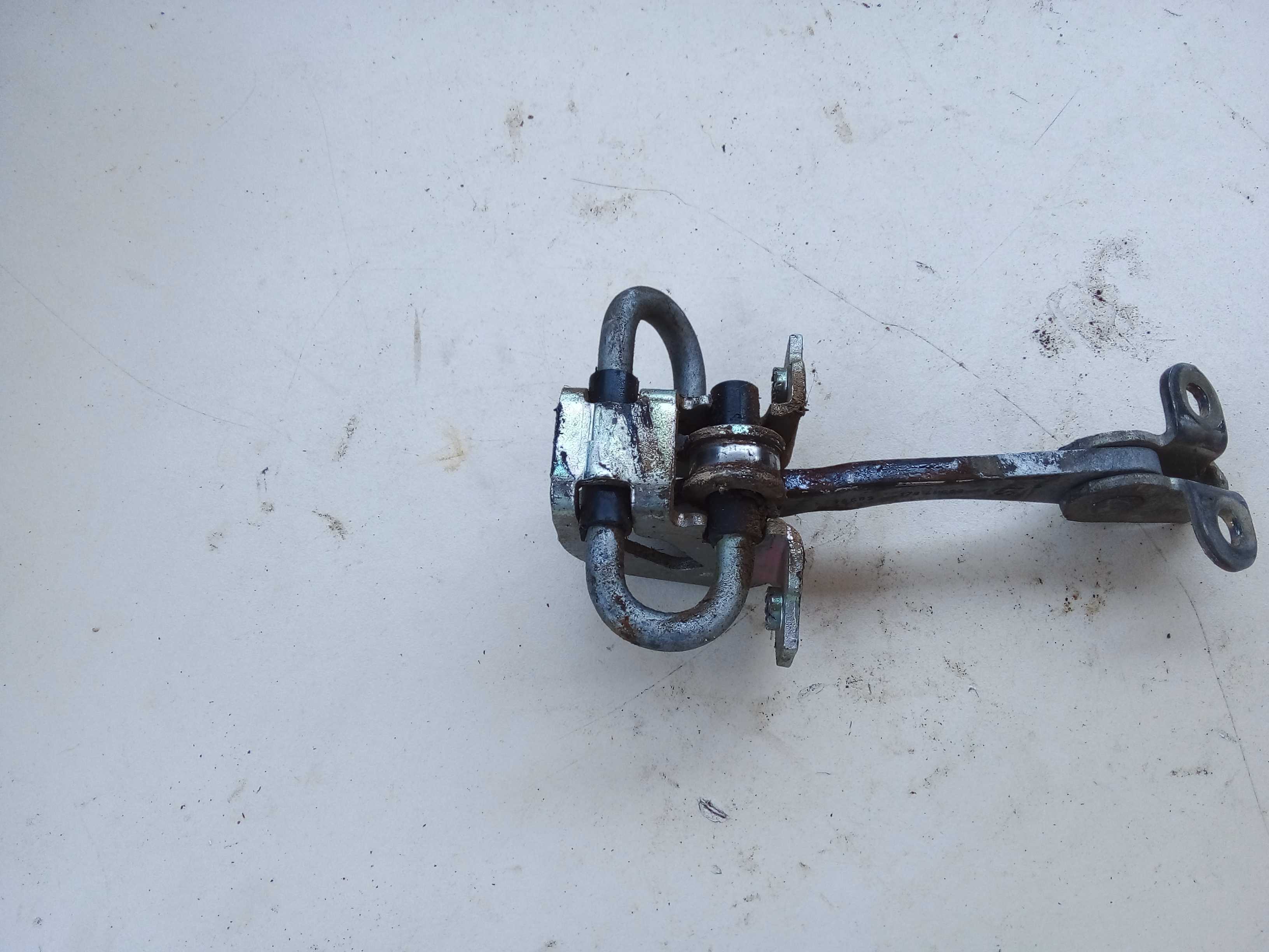 LIMITADOR PORTA TRÁS DIREITA PALIO SAPAO 2010 1