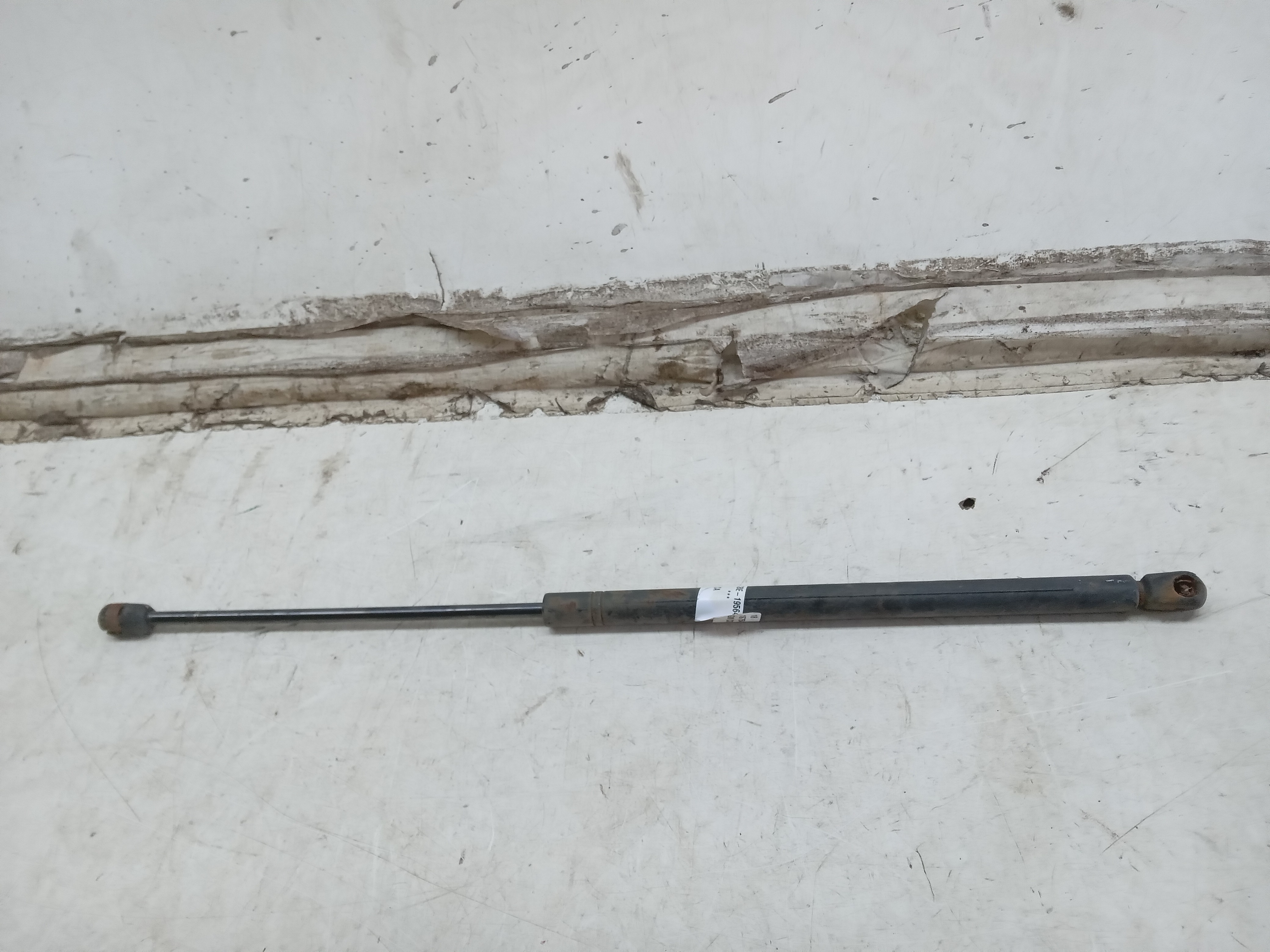 AMORTECEDOR TAMPA TRASEIRA GM CORSA 2002