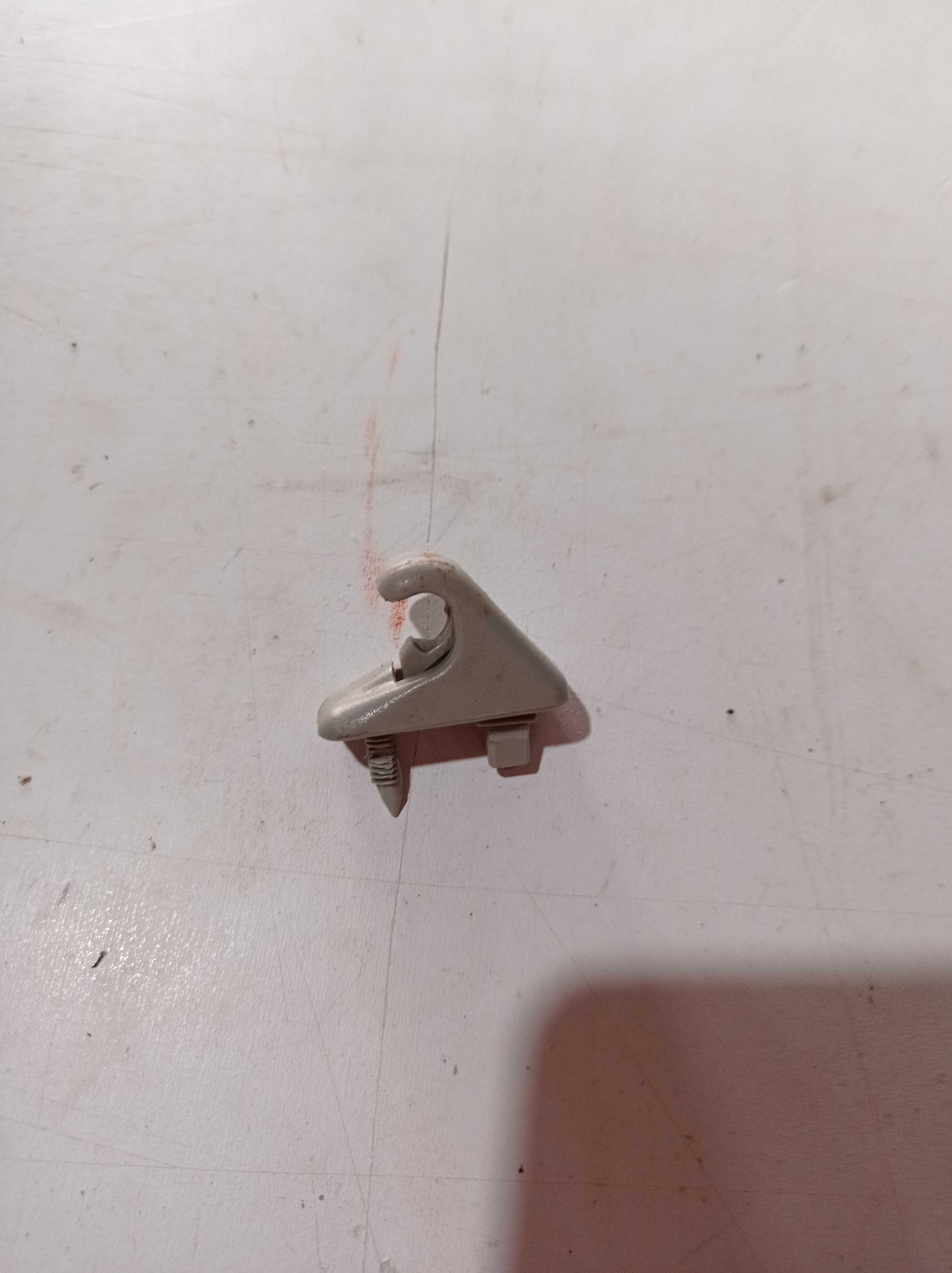 SUPORTE PRESILHA QUEBRA SOL TOYOTA HILUX 2010 1