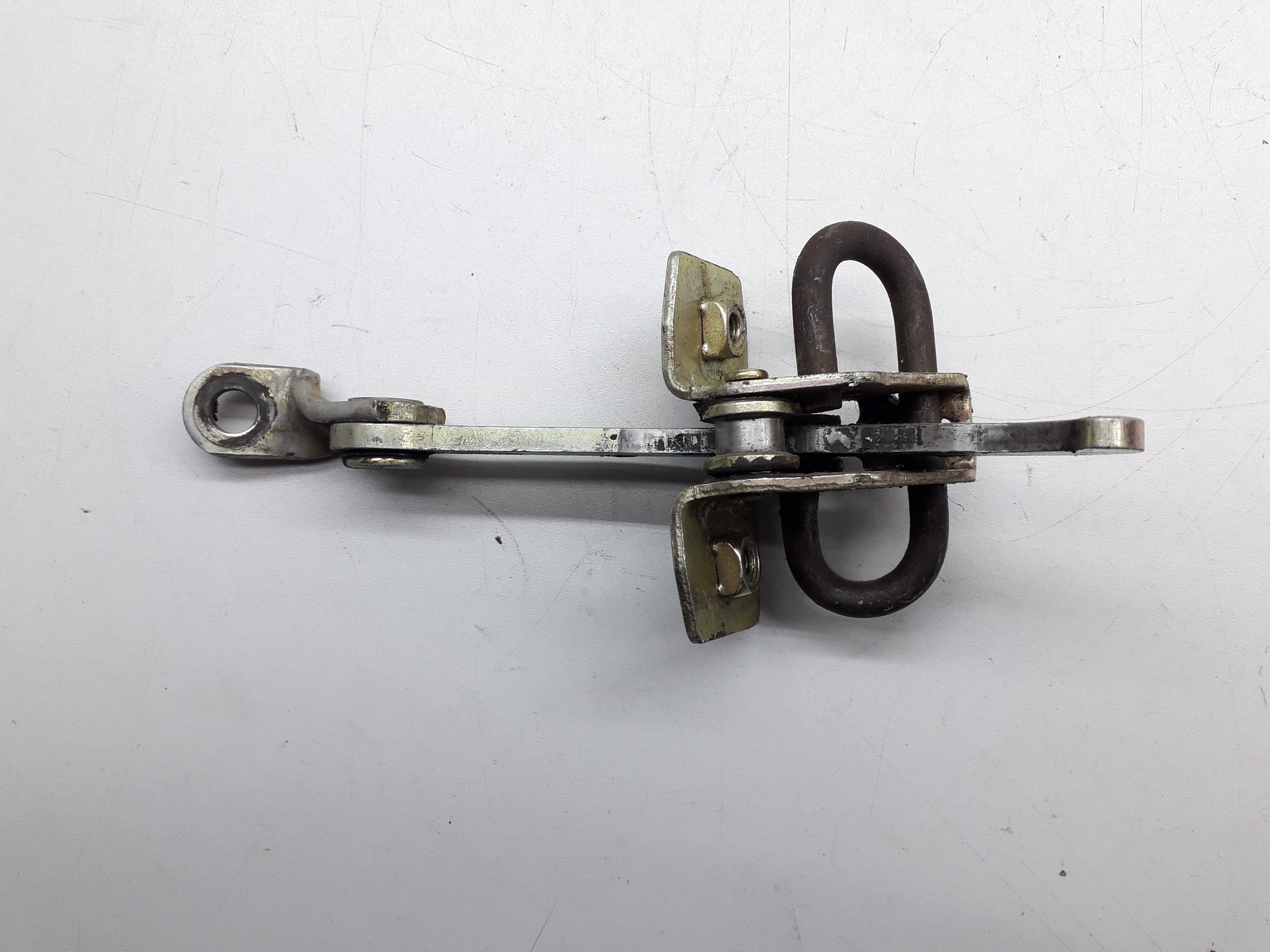 Limitador Porta Dianteira Vw Gol Parati Saveiro 1