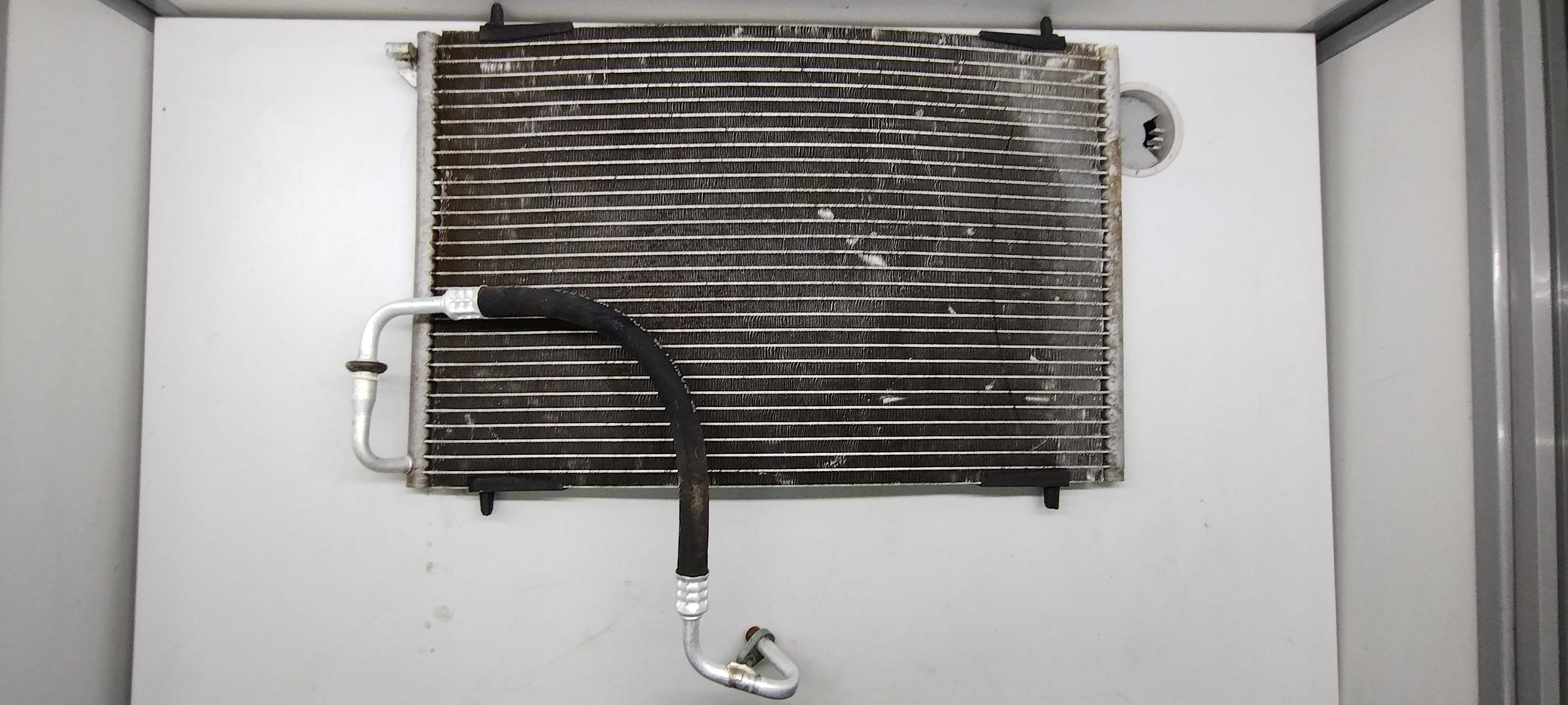 Condensador Ar Condicionado Peugeot 206 207 1.499/09 Usado 1