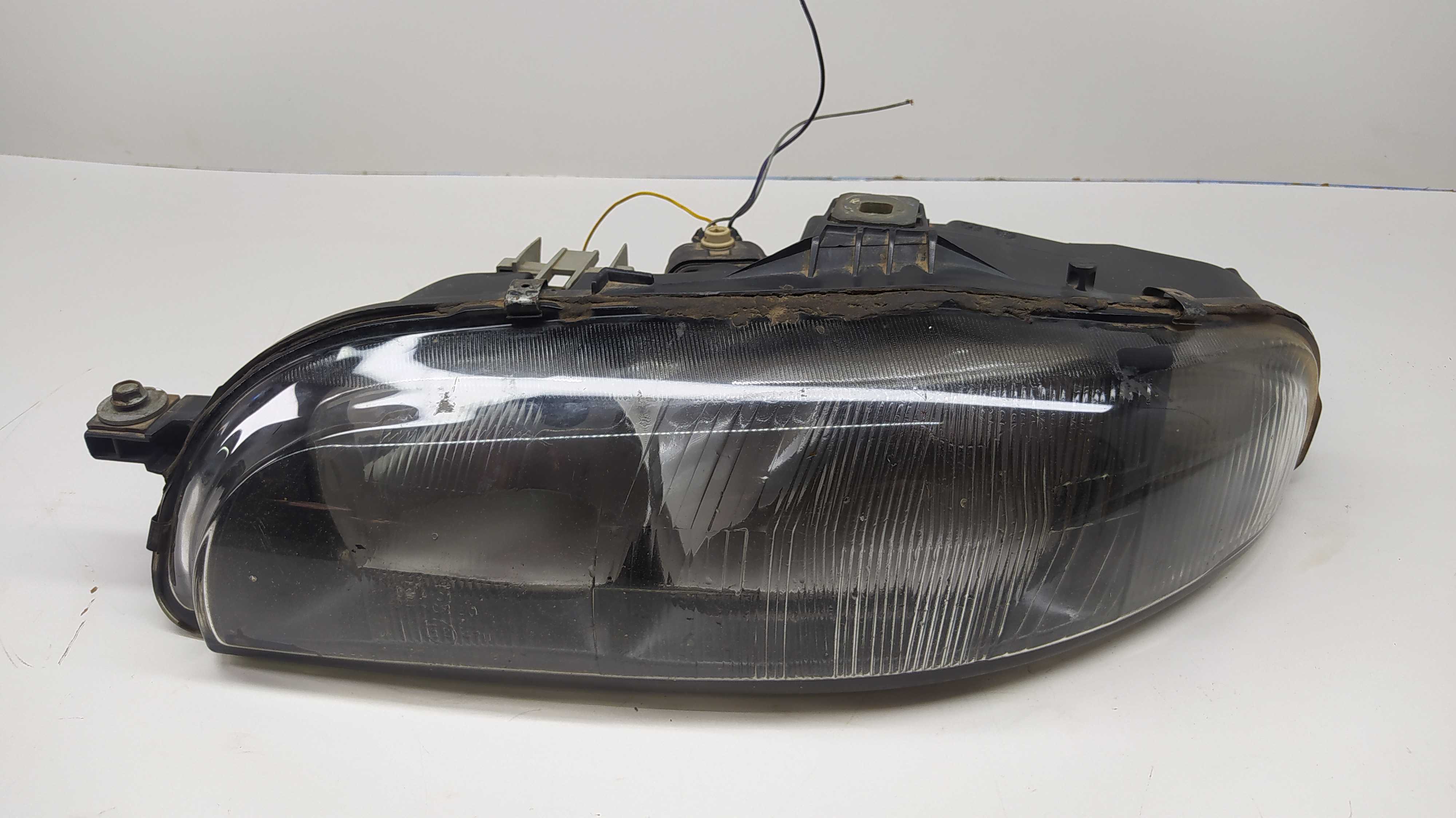 Farol Esquerdo Fiat Brava 1