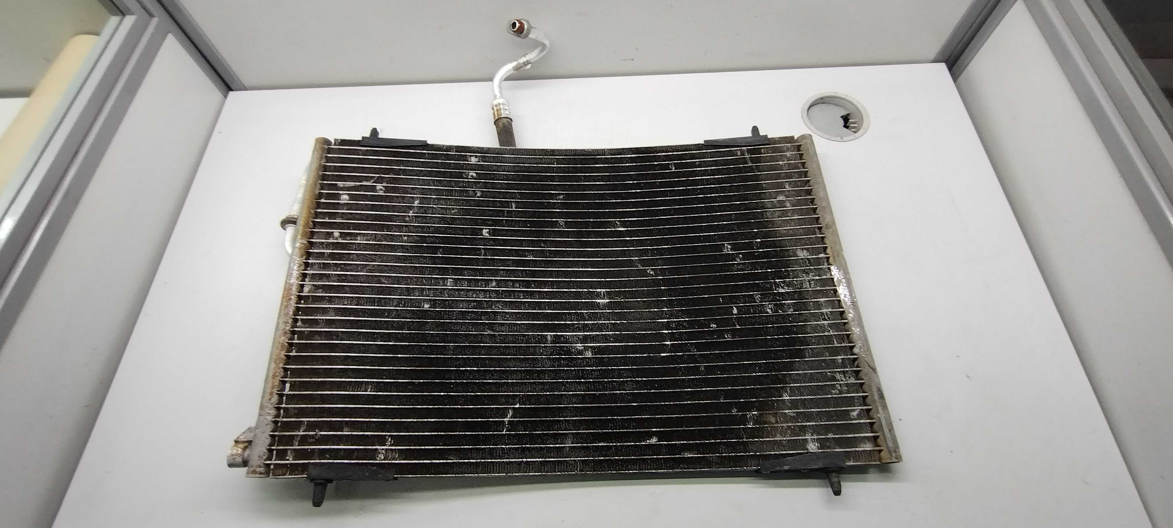 Condensador Ar Condicionado Peugeot 206 207 1.499/09 Usado 2