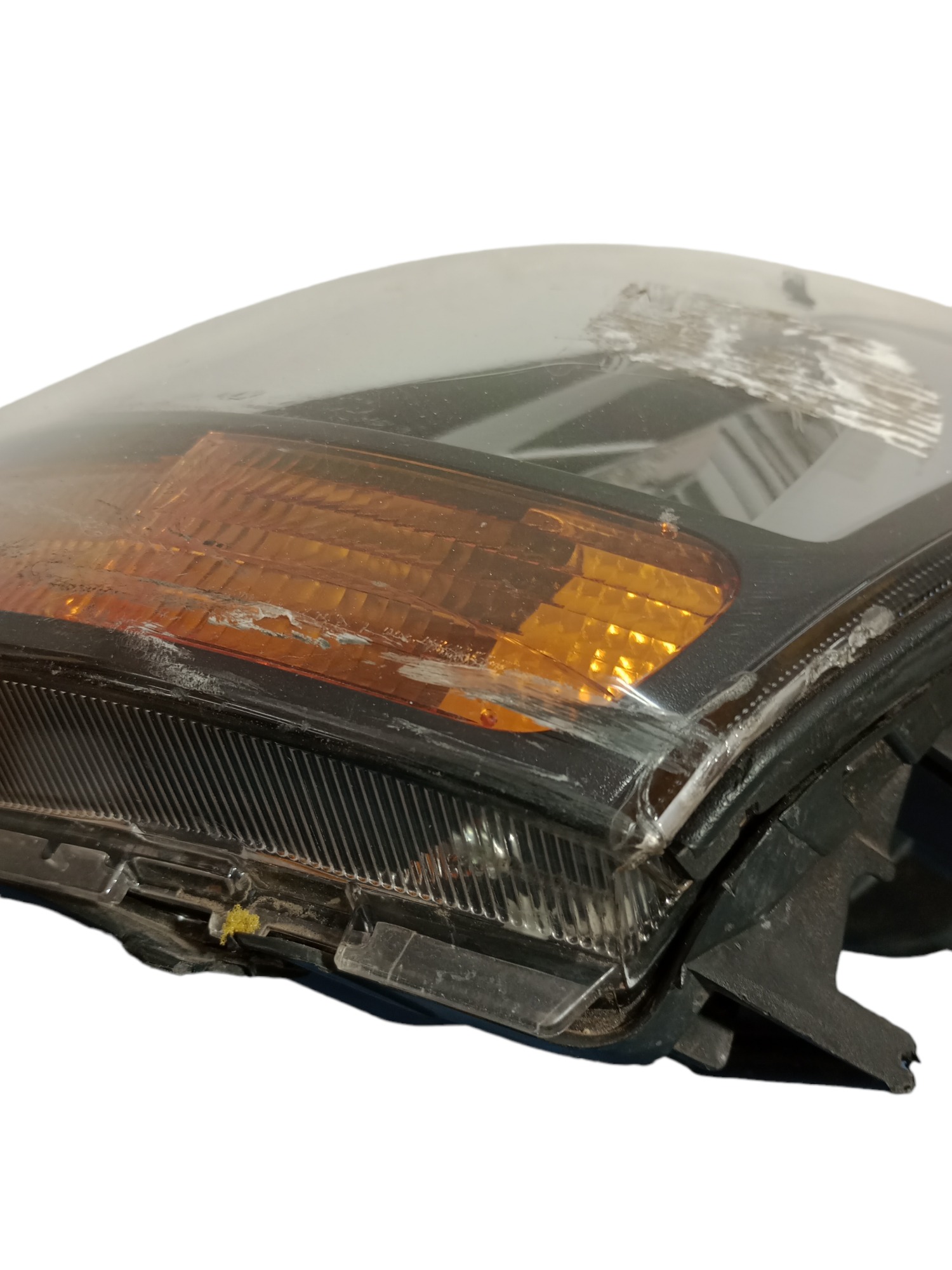 Farol L/E original tucson 2007 a 15 original detalhe lente 6
